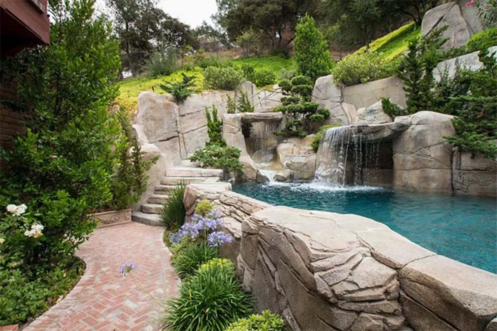 Create a Lavish Oasis with a Rocky Hillside Pool
